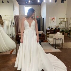 Elegant White Wedding Dress with Deep V-Neck